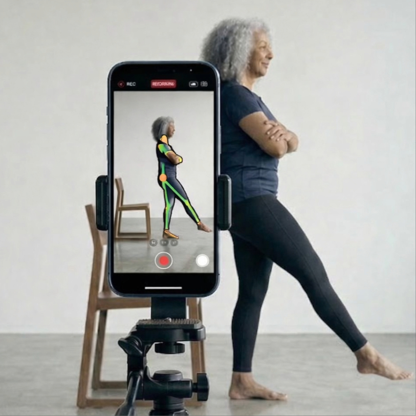 Concierge physician presenting longitudinal wellness report to patient